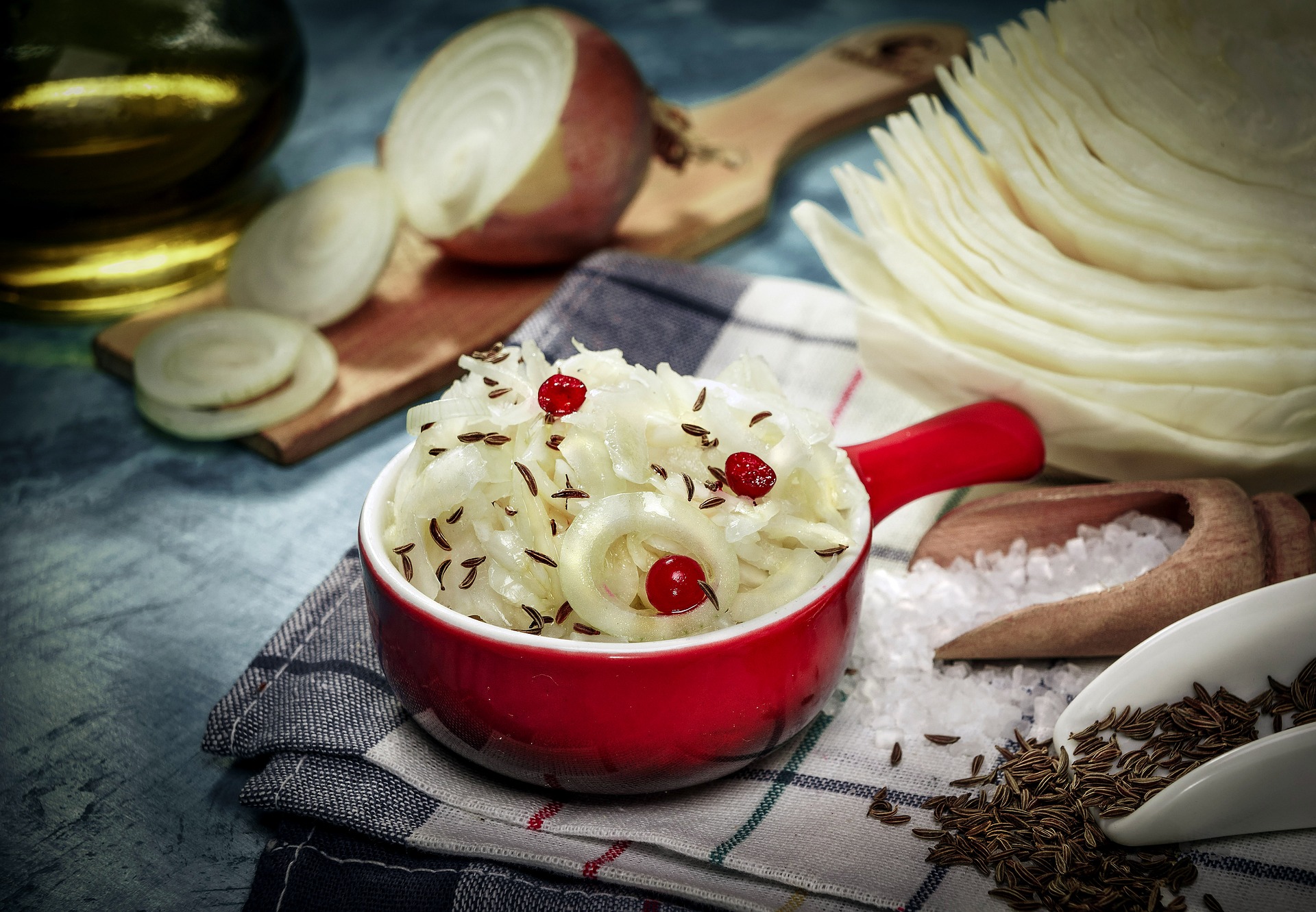 Sauerkraut in red bowl on table